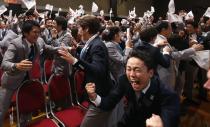 RNPS - PICTURES OF THE YEAR 2013 - Members of the Tokyo bid committee celebrate as Jacques Rogge President of the International Olympic Committee (IOC) announces Tokyo as the city to host the 2020 Summer Olympic Game during a ceremony in Buenos Aires September 7, 2013. REUTERS/Marcos Brindicci (ARGENTINA - Tags: SPORT OLYMPICS TPX)