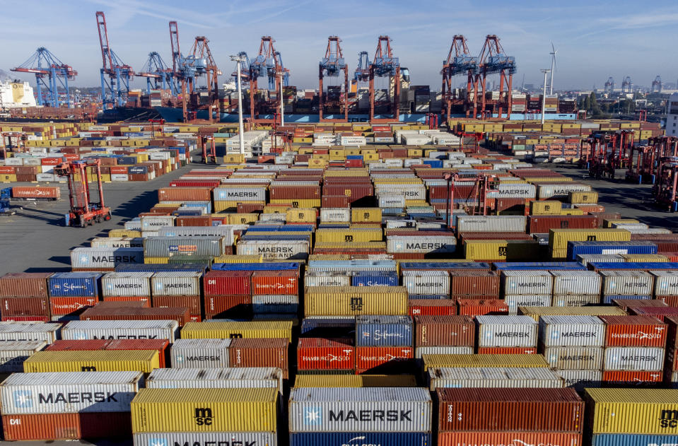 FILE - Containers are piled up in the harbor in Hamburg, Germany, Oct. 26, 2022. Germany's national statistics office says that the country's economy appears to have stagnated in the fourth quarter. It said Friday that Europe’s biggest economy managed full-year growth of 1.9% — slowing somewhat from 2021 as the impact of Russia’s war in Ukraine weighed on its performance. (AP Photo/Michael Probst, File)