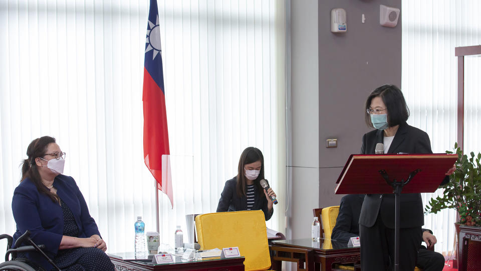 FILE - In this June 6, 2021, file photo released by the Taiwan Presidential Office, President Tsai Ing-wen, right, speaks near U.S. Democratic Sen. Tammy Duckworth, left, of Illinois in Taipei, Taiwan. The U.S. is sending 2.5 million doses of the Moderna COVID vaccine to Taiwan, tripling an earlier pledge in a donation with both public health and geopolitical meaning. (Taiwan Presidential Office via AP, File)