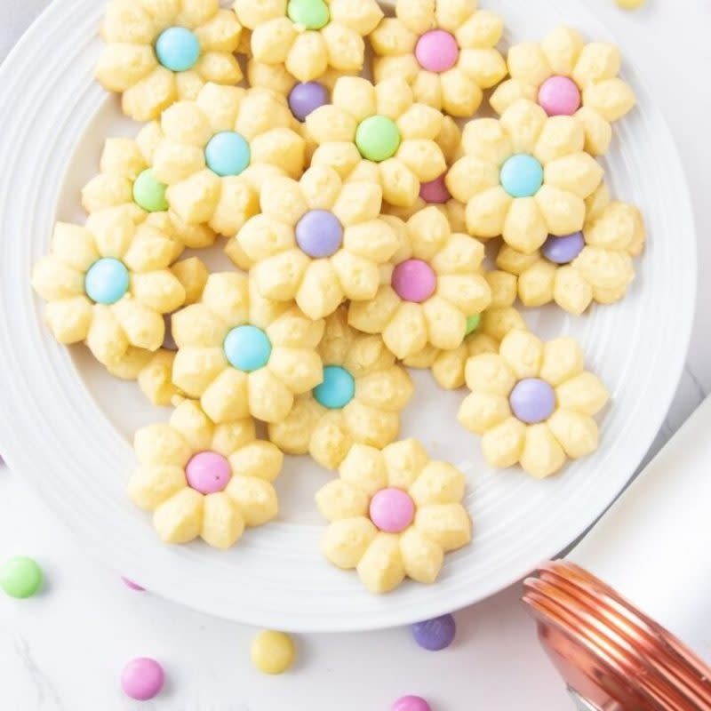 <p>Passion for Savings</p><p>Grab that cookie press and whip up a batch or two of these incredible Easter Spritz Cookies! A cream cheese spritz cookie that is so buttery, rich, and melts in your mouth. A simple cookie recipe that you will want to make over and over again. </p><p><strong>Get the recipe: <a href="https://www.passionforsavings.com/easter-spritz-cookies-recipe/" rel="nofollow noopener" target="_blank" data-ylk="slk:Easter Spritz Cookies;elm:context_link;itc:0;sec:content-canvas" class="link rapid-noclick-resp">Easter Spritz Cookies</a></strong></p>