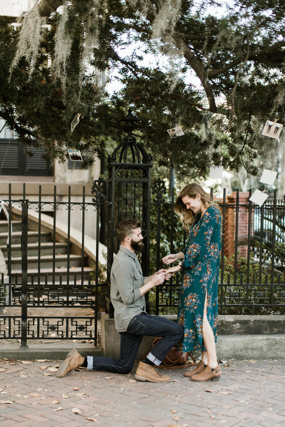 <p>When one man lined the trees of a Savannah neighborhood with photos of him and his girlfriend, pure romance ensued with a charming hometown proposal. </p><p><em>Via <a rel="nofollow noopener" href="http://www.stefaniekeeler.com/" target="_blank" data-ylk="slk:Stefanie Keeler;elm:context_link;itc:0;sec:content-canvas" class="link ">Stefanie Keeler</a> and <a rel="nofollow noopener" href="http://junebugweddings.com/wedding-blog/sweet-surprise-proposal-and-engagement-session-in-savannah-georgia/" target="_blank" data-ylk="slk:Junebug Weddings;elm:context_link;itc:0;sec:content-canvas" class="link ">Junebug Weddings</a></em><br></p>
