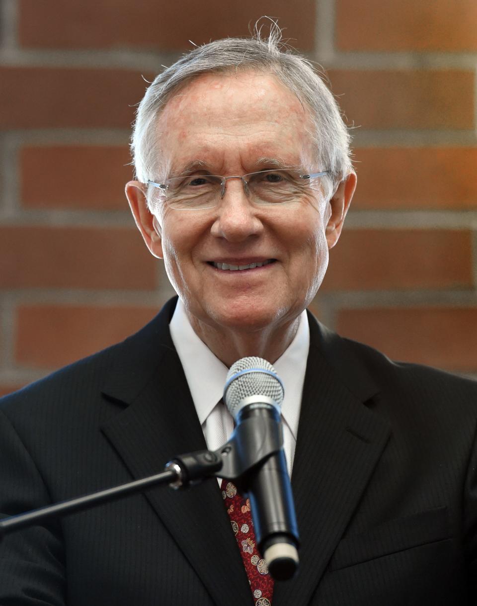 April 14, 2014; Reno, NV, USA; Senator Harry Reid speaks into the Rotunda room of the IGT Knowledge Center on the UNR campus on Monday April 14, 2014.  Mandatory Credit: Andy Barron-USA TODAY NETWORK ORIG FILE ID:  20211229_ajw_usa_038.JPG