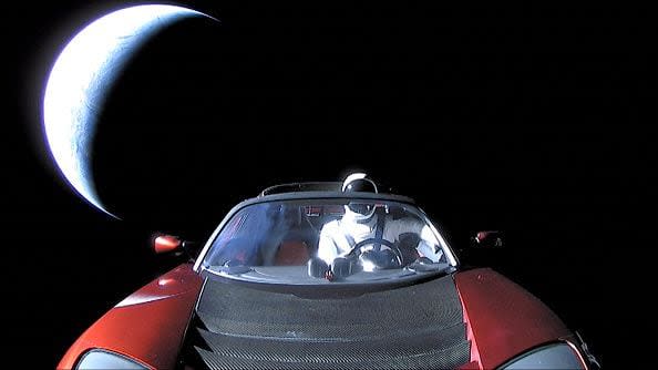 IN SPACE - FEBRUARY 8: In this handout photo provided by SpaceX, a Tesla roadster launched from the Falcon Heavy rocket with a dummy driver named 