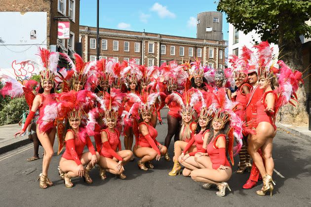 The Passistas of the Paraiso School of Samba pose for a photo. (Photo: Clara Watt for HuffPost)