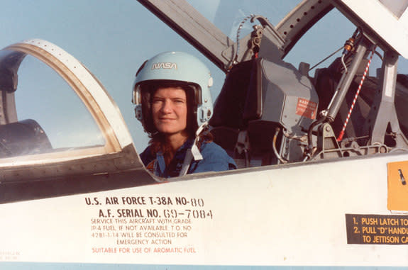 Astronaut Sally Ride seen in a NASA T-38 training jet wearing her flight helmet. The same helmet is now a part of the Smithsonian's collection, along with other items and papers that belonged to the first American woman in space.