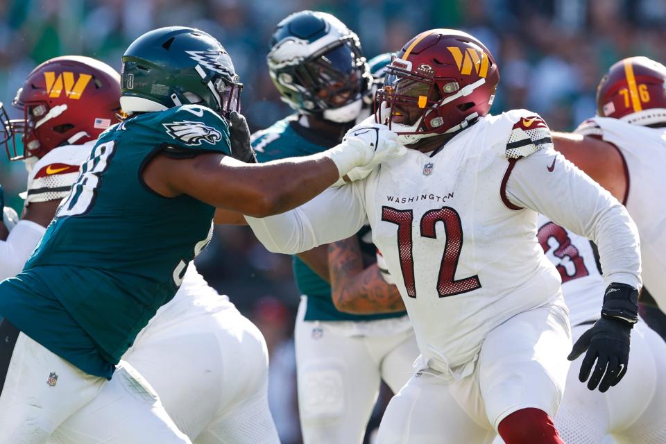 Philadelphia Eagles defensive tackle Jalen Carter (98) in action against Washington Commanders offensive tackle Charles Leno Jr. (72) during an NFL football game, Sunday, Oct. 1, 2023, in Philadelphia. The Eagles defeated the Commanders 34-31.