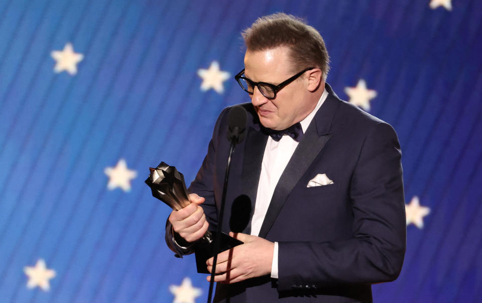 Brendan Fraser reacts as he accepts the Best Actor award for 