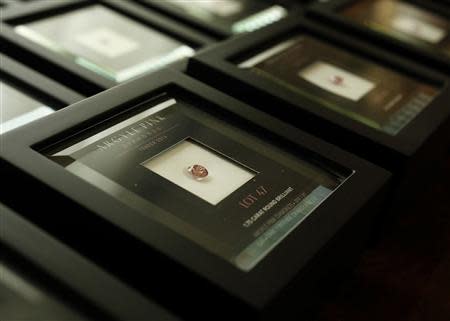 Rio Tinto pink diamonds in boxes are displayed in Hong Kong September 6, 2013. REUTERS/Bobby Yip