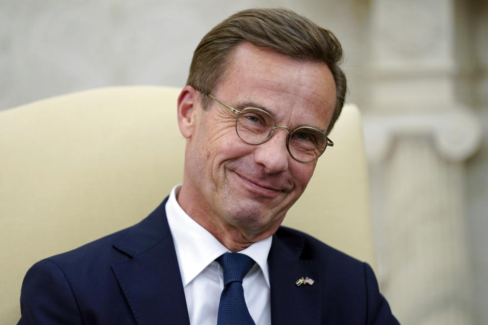 FILE - Swedish Prime Minister Ulf Kristersson smiles as he meets with President Joe Biden in the Oval Office of the White House, Wednesday, July 5, 2023, in Washington. (AP Photo/Evan Vucci, FIle)