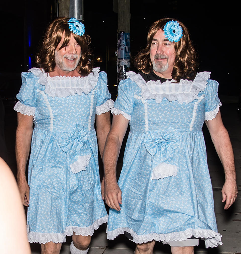 <p>Also at Shyamalan’s: Willis and his BFF/assistant Stephen J. Eads dressed as the infamous twins from <i>The Shining</i>. The star really could have just came as his <i>Sixth Sense</i> character, because that movie is still creepy! (Photo: Gilbert Carrasquillo/GC Images) </p>