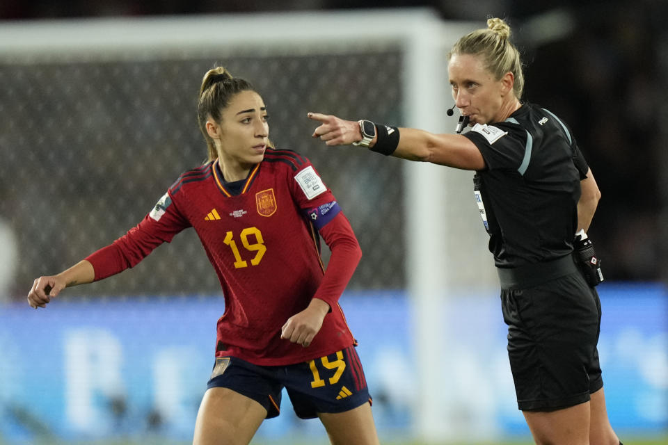 Referee Tori Penso, right, points on penalty as Spain's Olga Carmona reacts during the final of Women's World Cup soccer between Spain and England at Stadium Australia in Sydney, Australia, Sunday, Aug. 20, 2023. (AP Photo/Rick Rycroft)