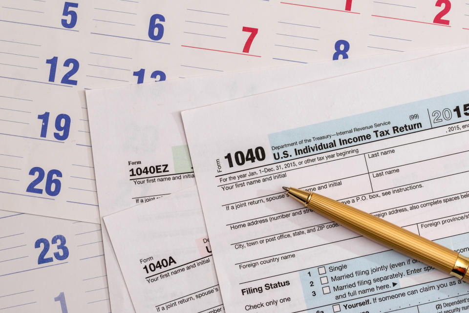 US 1040 tax form with calendar