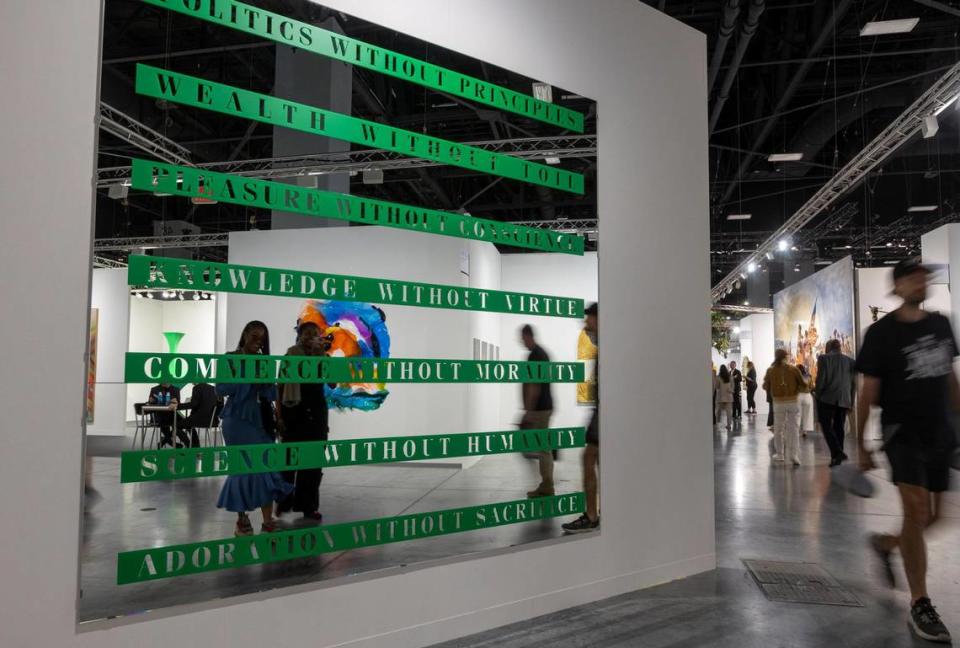 Miami Beach, Florida, December 6, 2023 - A work titled He Ram by artist Alfredo Saar hangs at the Miami Beach Convention Center during Art Basel VIP day.