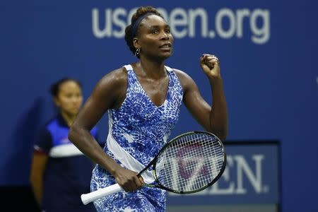 Venus Williams of the U.S. celebrates her victory over compatriot Irina Falconi in their second round match at the U.S. Open Championships tennis tournament in New York, September 2, 2015. REUTERS/Shannon Stapleton