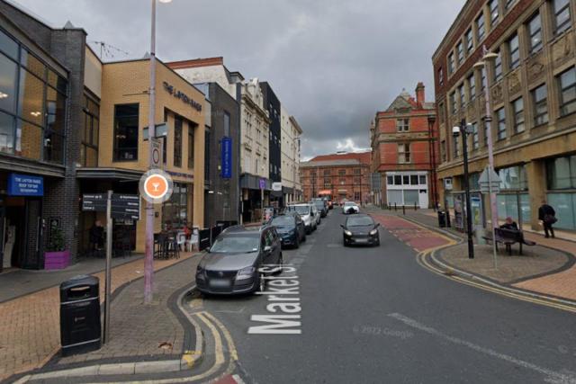 Roads closed and buses forced to divert after man climbs on car