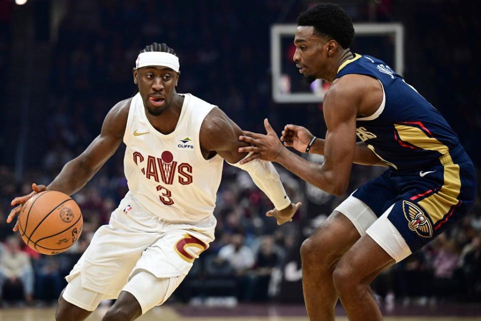 Cleveland Cavaliers guard Caris LeVert drives against New Orleans Pelicans forward Herbert Jones on Dec. 21, 2023, in Cleveland.