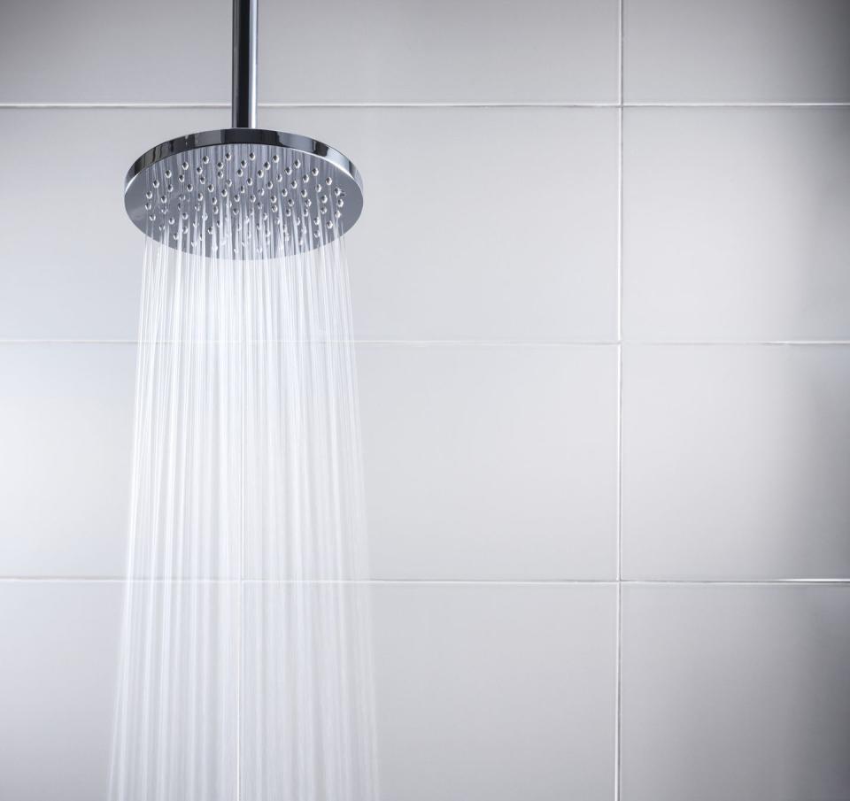 26) Remove hard-water buildup from your showerhead