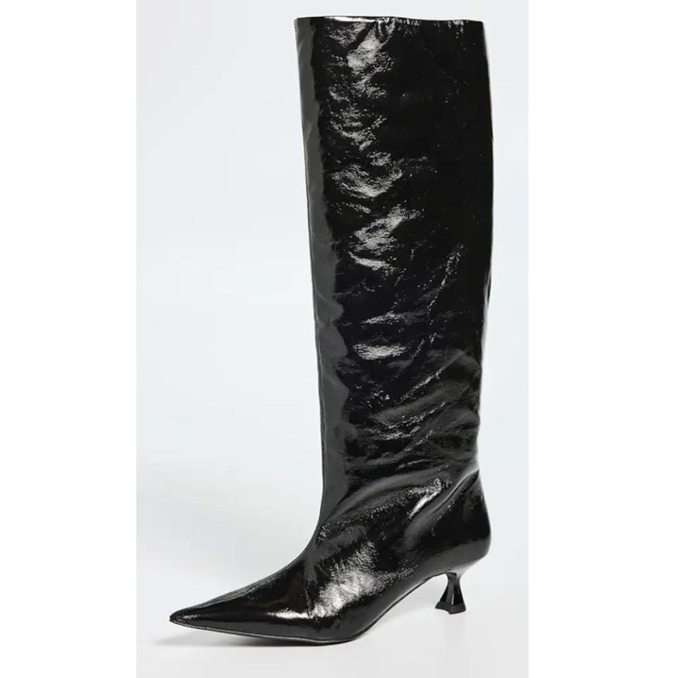 <p><a href="https://go.redirectingat.com?id=74968X1596630&url=https%3A%2F%2Fm.shopbop.com%2Fsoft-slouchy-high-shaft-boot%2Fvp%2Fv%3D1%2F1561138063.htm%3Fos%3Dfalse%26breadcrumb%3DShop%2BWomen%2527s%253EDesigner%2BIndex%253EGANNI%253EShoes%26folderID%3D41621%26colorSin%3D2006242197%26fm%3Dother-shopbysize%26ref_%3DSB_PLP_PDP_W_BRAND_GANNI_41621_EP_6&sref=https%3A%2F%2F" rel="nofollow noopener" target="_blank" data-ylk="slk:Shop Now;elm:context_link;itc:0;sec:content-canvas" class="link ">Shop Now</a></p><p>Soft Slouchy Boot</p><p>shopbop.com</p><p>$431.25</p><span class="copyright">Shopbop</span>