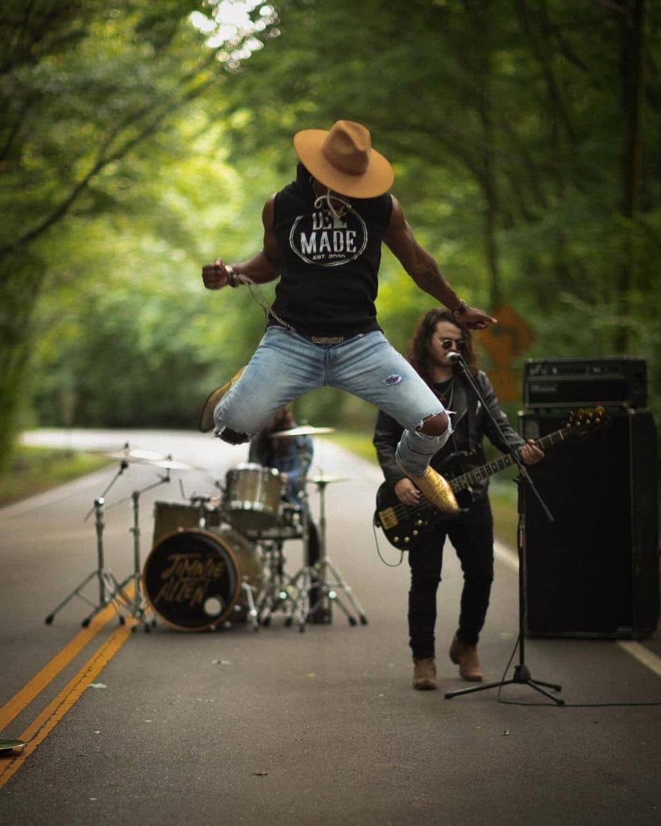 Country singer Jimmie Allen wears a DEL Made shirt while filming a music video.