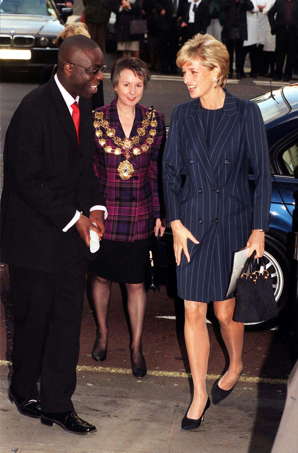 Princess Diana wore a very similar, above-the-knee tuxedo dress for her own charity event back in 1996. Photo: Getty