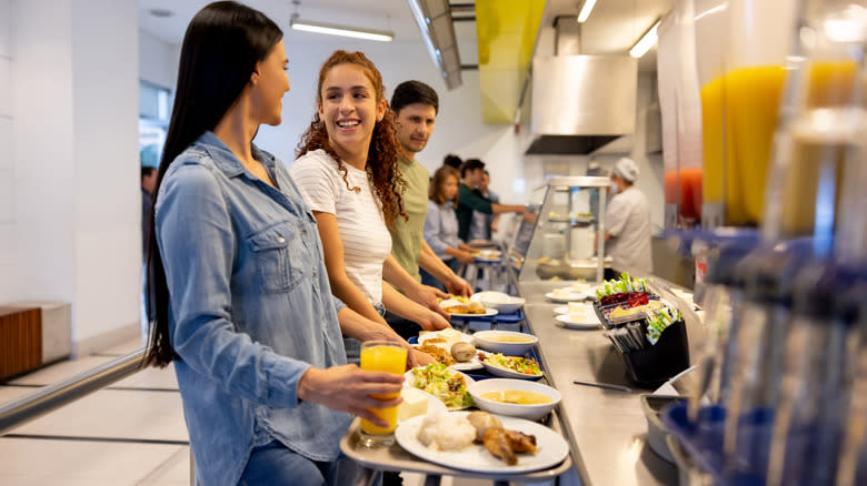 happy people in buffet line