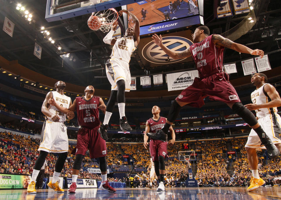 Wichita State forward Cleanthony Early tips the ball in for a score during the first half of an NCAA college basketball game against Missouri State in the semifinals of the Missouri Valley Conference men's tournament Saturday, March 8, 2014, at the Scottrade Center in St. Louis. (AP Photo/St. Louis Post-Dispatch, Chris Lee) EDWARDSVILLE INTELLIGENCER OUT; THE ALTON TELEGRAPH OUT