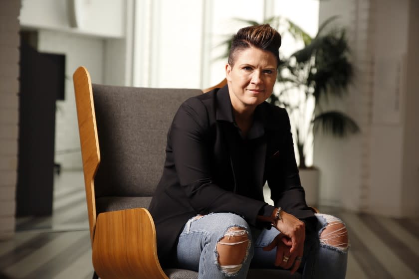 LOS ANGELES, CA - MAY 13: Tracey Breeden, former cop and public safety officer, was hired last year to head security at Match Group, which owns several dating apps including Tinder, and stands for a portrait at the Tinder Headquarters in West Hollywood on Thursday, May 13, 2021 in Los Angeles, CA. One of Breeden's first initiatives was introducing background checkss at Tinder. (Dania Maxwell / Los Angeles Times)