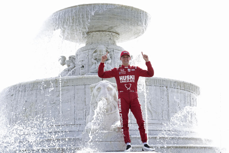 Marcus Ericsson, of Sweden, celebrates winning the first race of the IndyCar Detroit Grand Prix auto racing doubleheader on Belle Isle in Detroit, Saturday, June 12, 2021. (AP Photo/Paul Sancya)