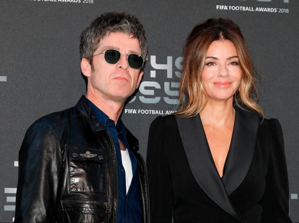 Noel Gallagher with his now ex-wife, Sarah MacDonald (AFP via Getty Images)