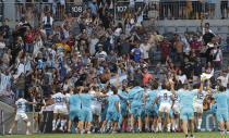 Argentina players wave to their supporters as they celebrate after the Tri-Nations rugby test between Argentina and New Zealand at Bankwest Stadium, Sydney, Australia, Saturday, Nov.14, 2020. Argentina defeated the All Blacks 25-15. (AP Photo/Rick Rycroft)