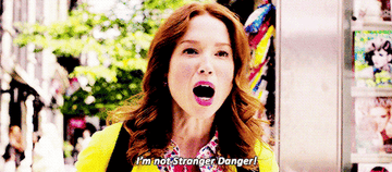 Kimmy Schmidt talking to a stranger.