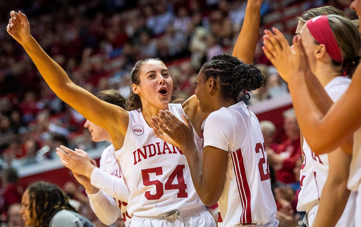 Indiana's Mackenzie Holmes (54) cheers that every Hoosier scored points during the second half of the Indiana versus Eastern Illinois women's basketball game at Simon Skjodt Assembly Hall on Thursday, Nov. 9, 2023.