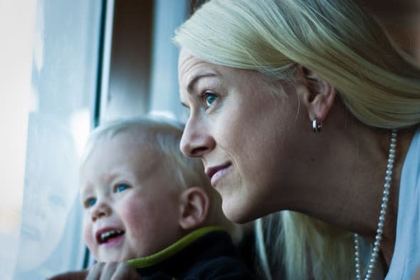 Mother and son looking out.