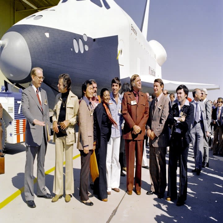 The Star Trek cast poses with the Shuttle Enterprise in 1976