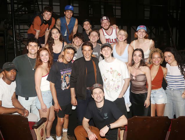 <p>Bruce Glikas/WireImage</p> Ralph Macchio poses with the cast backstage at the hit 2024 Tony Award Winning Best Musical 'The Outsiders: The Musical' on Broadway at The Bernard B. Jacobs Theatre