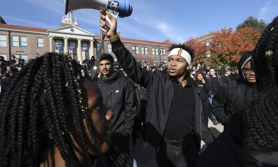 Madison West High School senior Noah Anderson, 17, president of the school’s Black Student Union and son of the school’s recently-fired security guard Marlin Anderson, leads a rally in support of his father outside the school in Madison, Wisconsin, on Friday.