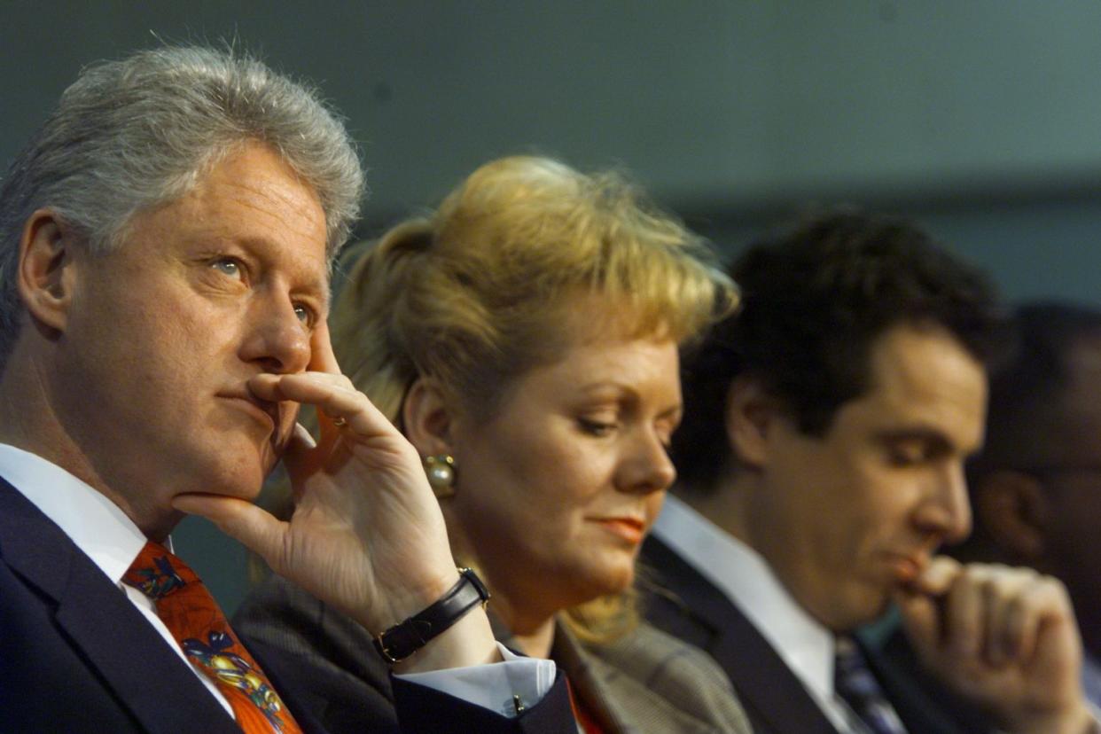 President Clinton, left, made a trip to Baltimore on Wednesday, Dec. 23, 1998, with HUD Secretary Andrew Cuomo on the subject of homelessness. Christa Spangler, center,  who introduced the President and Andrew Cuomo.