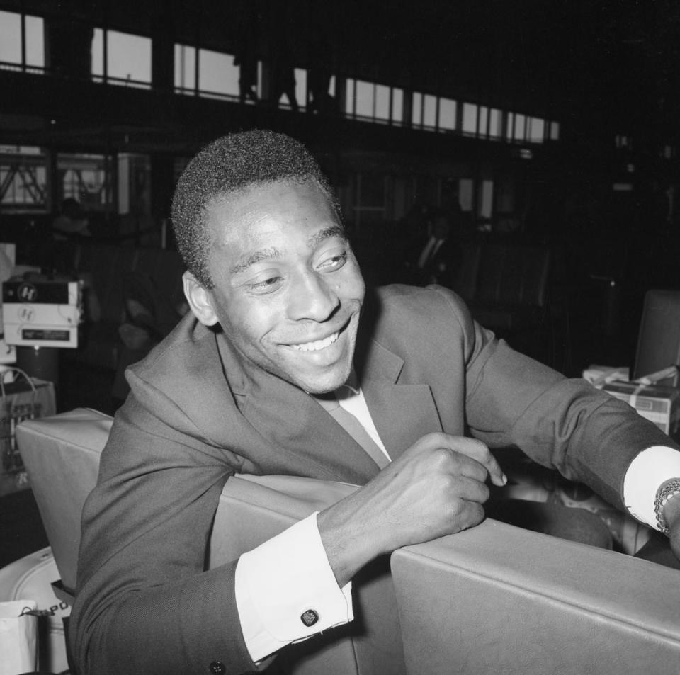 Brazilian footballer Pele waiting at London Airport for his team's plane home after the 1966 World Cup in England, 25th July 1966.  (Getty Images)