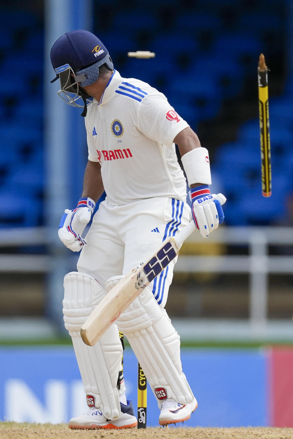 India's Ajinkya Rahane is bowled by West Indies' Shannon Gabriel on day one of their second cricket Test match at Queen's Park in Port of Spain, Trinidad and Tobago, Thursday, July 20, 2023. (AP Photo/Ricardo Mazalan)