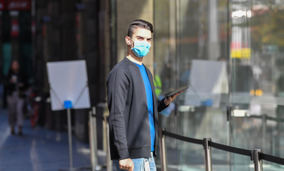 Man wearing a mask amid debate about Covid rules in NSW. 