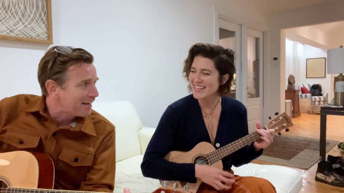 Ewan and Mary play guitars together