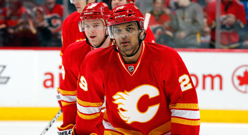 CALGARY, CANADA - APRIL 7: Akim Aliu #29 of the Calgary Flames skates to the bench after socring his first NHL goal against the Anaheim Ducks on April 7, 2012 at the Scotiabank Saddledome in Calgary, Alberta, Canada. (Photo by Gerry Thomas/NHLI via Getty Images) 