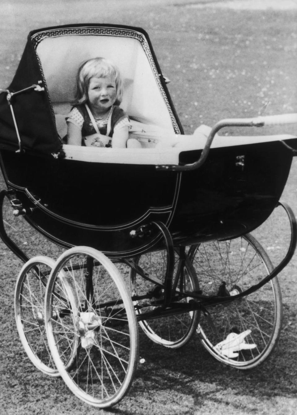 <p>Young Diana, pictured in her stroller at Park House, Sandringham in Norfolk, 1963. She was born into an aristocratic family; the Queen even <a href="http://www.bbc.co.uk/news/special/politics97/diana/ob-child.html" rel="nofollow noopener" target="_blank" data-ylk="slk:attended her parents' wedding;elm:context_link;itc:0;sec:content-canvas" class="link ">attended her parents' wedding</a>. </p>