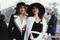 <p>Jerry Hall and Marie Helvin in black-and-white ensembles at the Royal Ascot. </p>