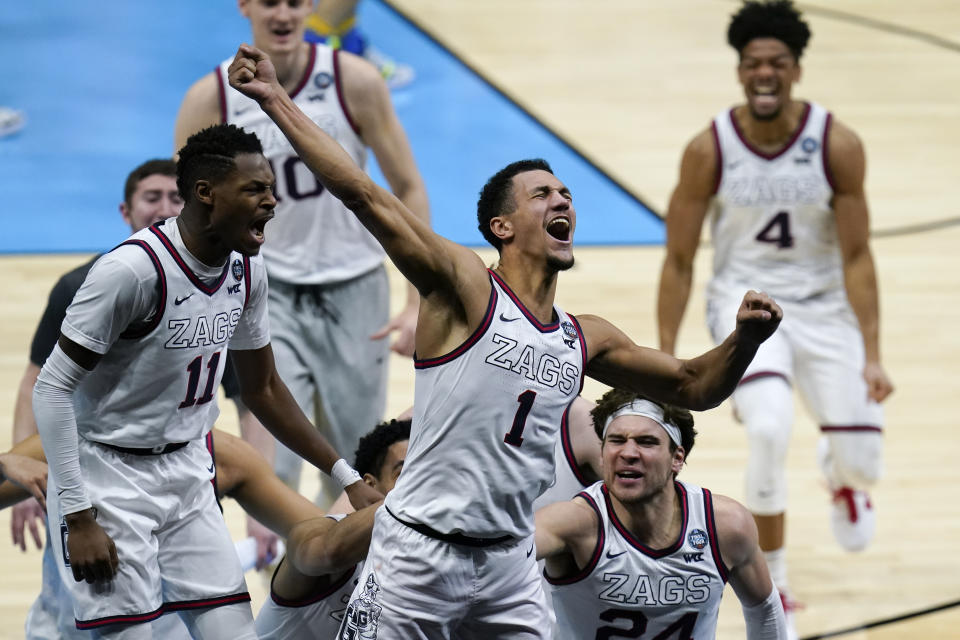 Gonzaga guard Jalen Suggs (1) celebrates making the game winning basket against UCLA during overtime in a men's Final Four NCAA college basketball tournament semifinal game, Saturday, April 3, 2021, at Lucas Oil Stadium in Indianapolis. Gonzaga won 93-90. (AP Photo/Michael Conroy)