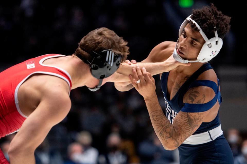 Penn State’s Roman Bravo-Young gets choked during a wrestling dual between Penn State and Rutgers on Sunday, Jan. 16, 2022 at Rec Hall in University Park, Pa. Penn State defeated the Scarlet Knights 27-11.