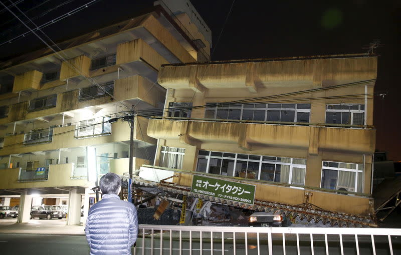 A damaged building caused by an earthquake is seen in Kumamoto, southern Japan, in this photo taken by Kyodo April 16, 2016. Mandatory credit REUTERS/Kyodo