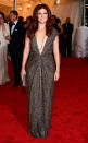 Debra Messing looked “Smash”ing in a cap-sleeve glittery gown with a super-plunging neckline. In December, the star announced she was splitting from her husband of 11 years, Daniel Zelman. “It's a new chapter in my personal life,” she recently told <i>Ladies’ Home Journal</i>. “I'm walking a path I've never walked before. But I'm optimistic.” With a figure like that, who wouldn’t be?