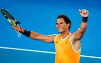 Rafael Nadal showed flashes of his best form as he eased past home favourite Matthew Ebden to reach the Australian Open third round. 