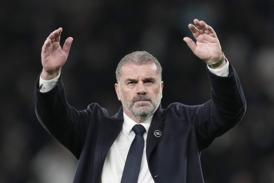 Tottenham's head coach Ange Postecoglou greets supporters at the end of the English Premier League soccer match between Tottenham Hotspur and Fulham at the Tottenham Hotspur Stadium in London, Monday, Oct. 23, 2023. (AP Photo/Kin Cheung)